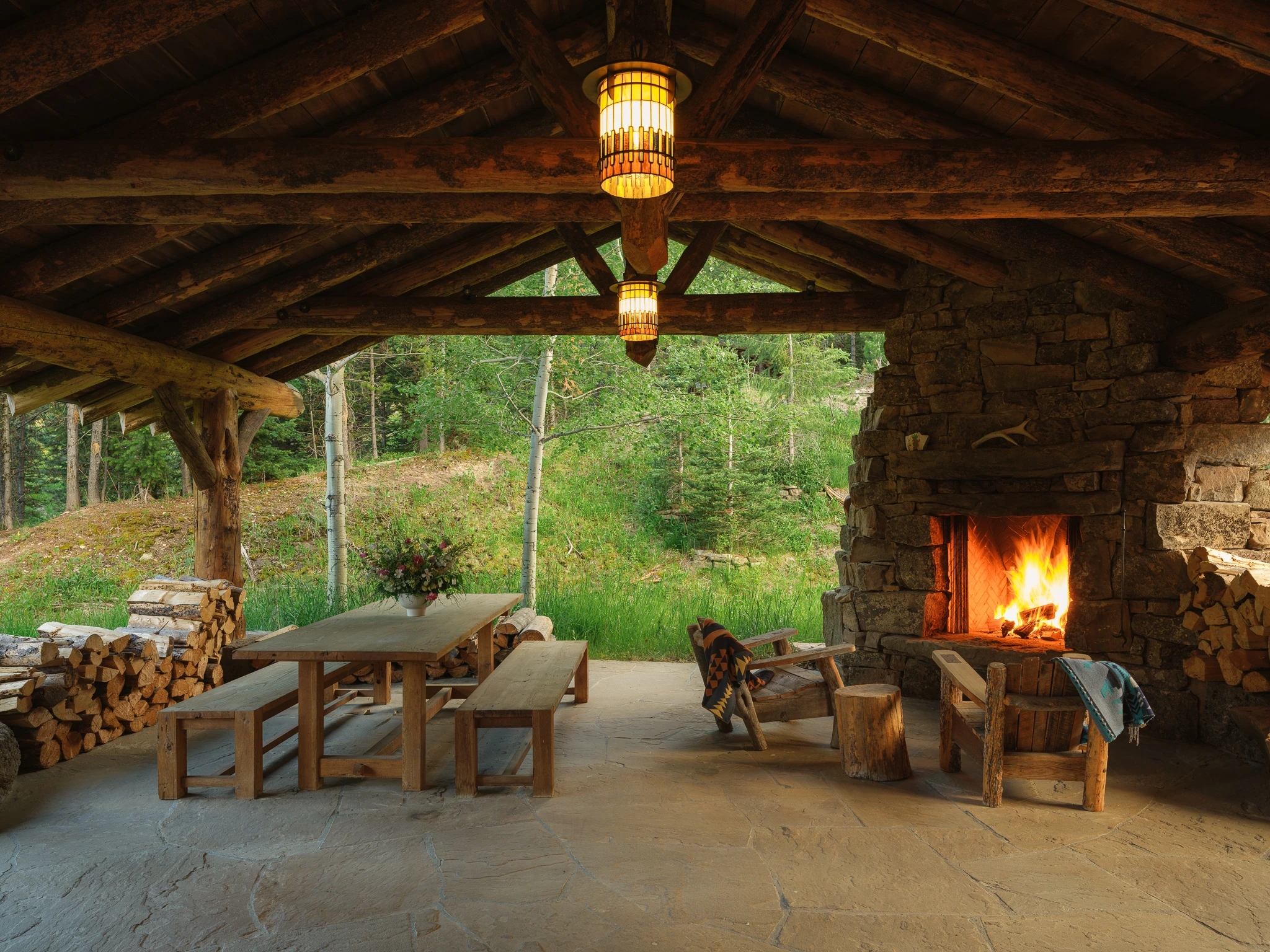 Outdoor living pavilion at dusk — architectural photography Big Sky Montana, Club Ridge